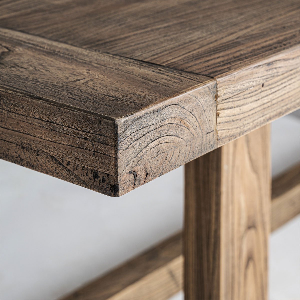 The natural wood detail of a farm table